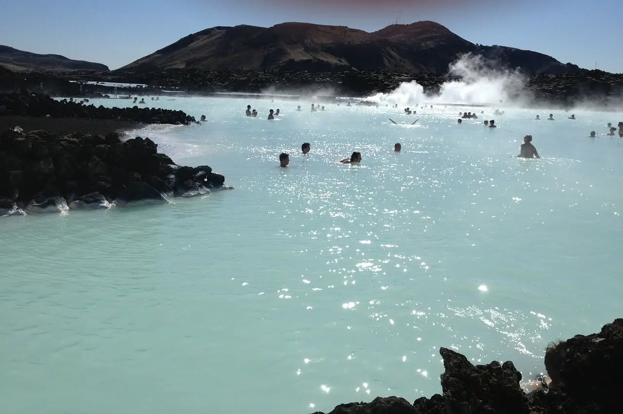 Blue Lagoon Hot Springs Surrounded By Rocks In Iceland