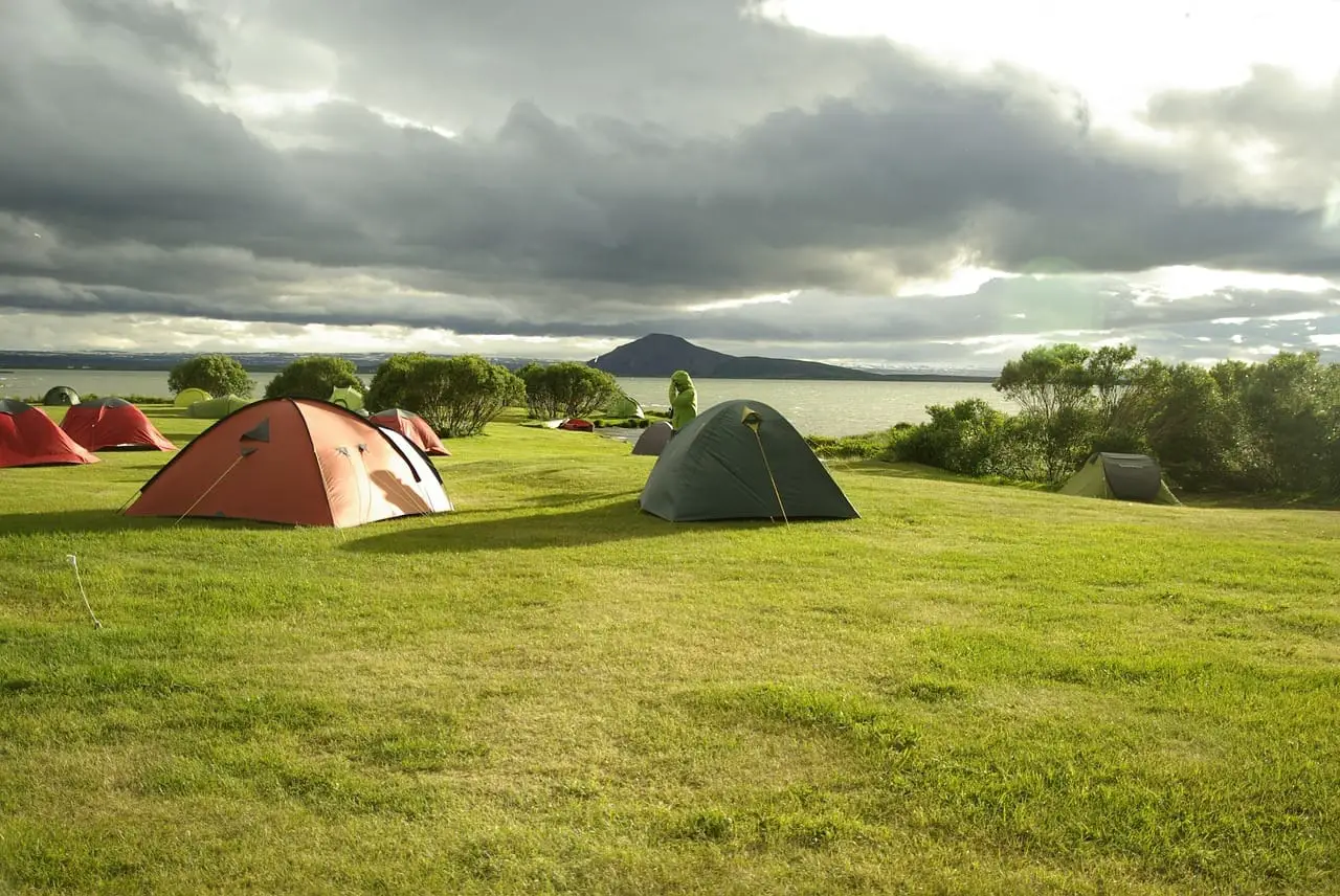 Camping Tents on a Grass Field