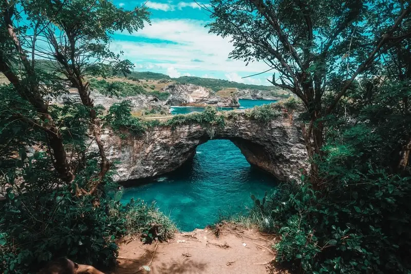 Arched tunnel at Broken Beach on Nusa Penida Island in Bali