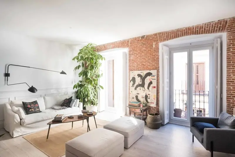 brick face apartment living room in Madrid Spain