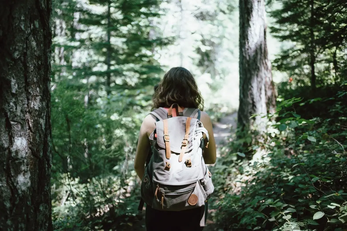 woman hiking with backpack