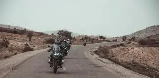 four motorcyclists in desert