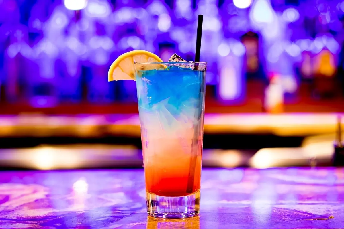 a-colourful-cocktail-drink-on-a-bar