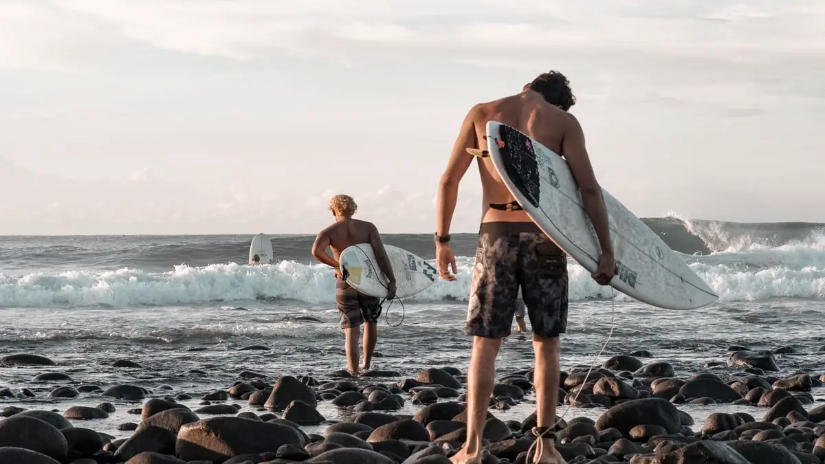 two-surfers-at-el-tunco-beach-el-salvador