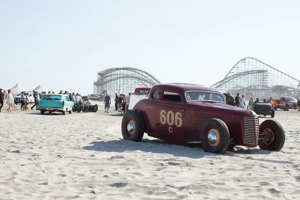 vintage-cars-on-the-beach-near-moreys-pier-wildwood-new-jersey