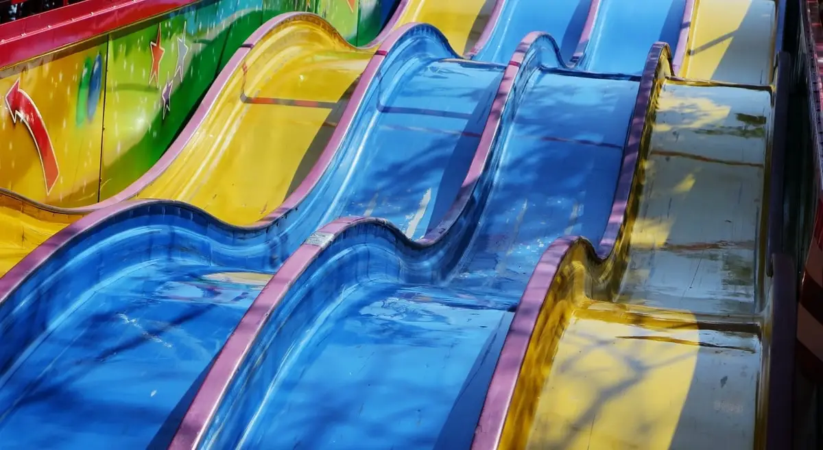 Yellow and blue water slides at a water park