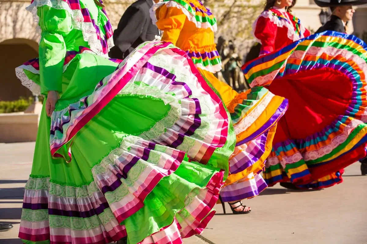 Women in colourful Mexican style dresses